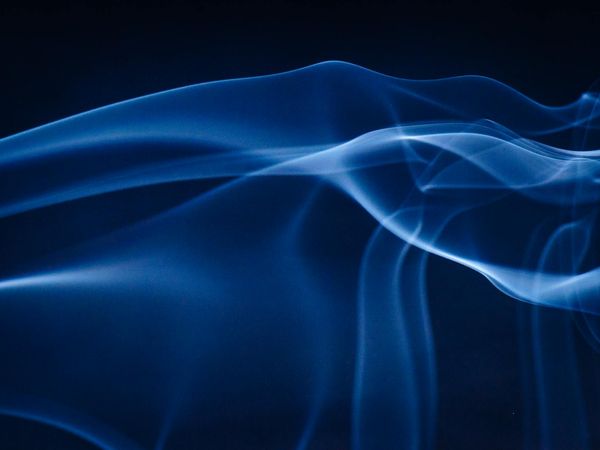 Ethereal blue light waves symbolizing physical and mental flow